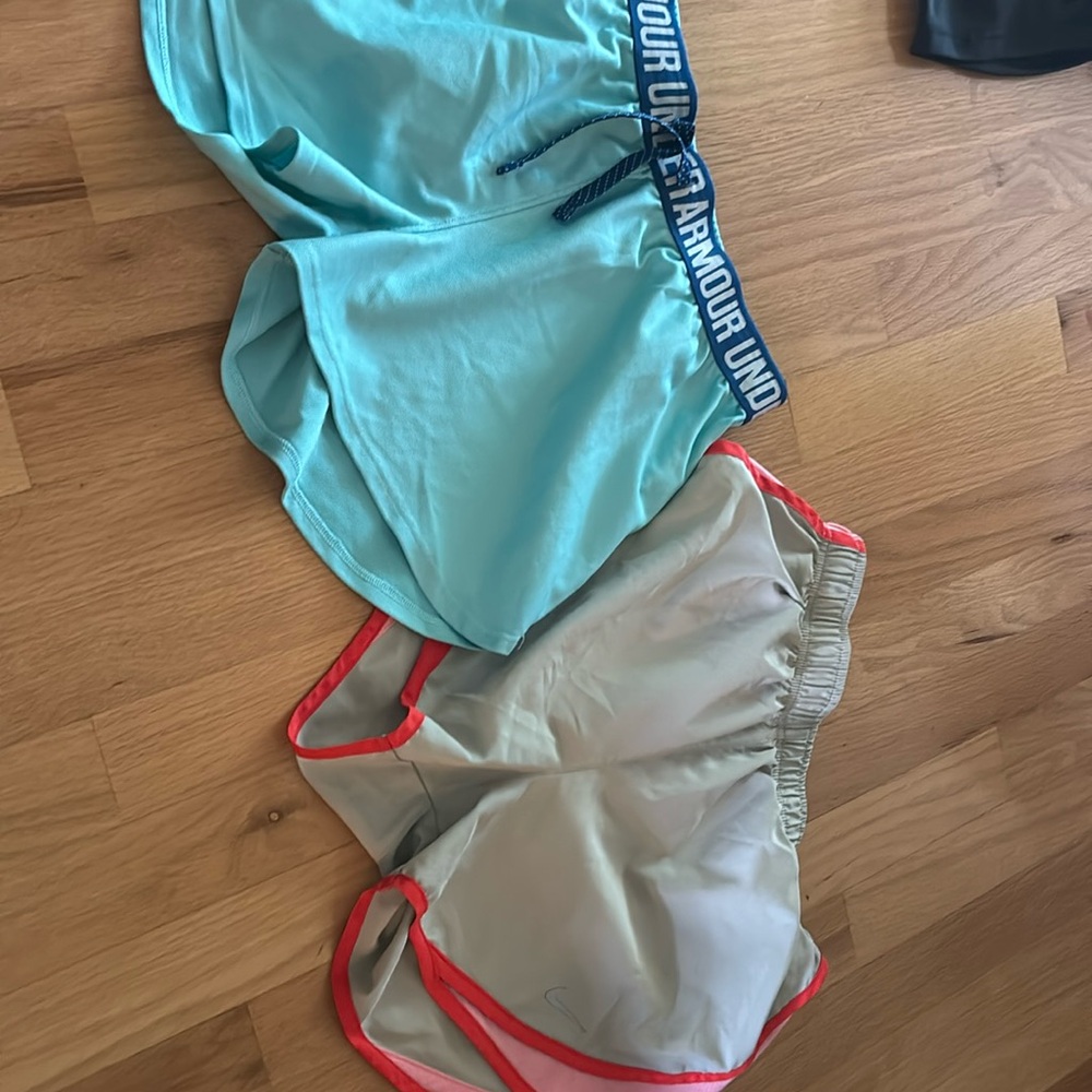 Under Armour and Nike running shorts